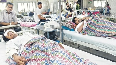 Mumbai, India. Dec 10, 2024.Aman Shah (Left) one of the bus accident victim. Injured people in a bus accident were admitted to Bhabha Hospital. Seven people were killed and 49 people injured after the BEST bus rammed with vehicles and people in the Kurla West area of Mumbai. Mumbai, India. Dec 10, 2024. (Photo by Raju Shinde/HT Photo) (Hindustan Times) Mumbai, India. Dec 10, 2024.Aman Shah (Left) one of the bus accident victim. Injured people in a bus accident were admitted to Bhabha Hospital. Seven people were killed and 49 people injured after the BEST bus rammed with vehicles and people in the Kurla West area of Mumbai. Mumbai, India. Dec 10, 2024. (Photo by Raju Shinde/HT Photo) (Hindustan Times)