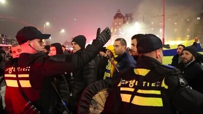 In this image taken from video, police escort Maccabi Tel Aviv supporters to the metro station leading them to the Ajax stadium, after pro-Palestinian supporters marched near the stadium, in Amsterdam (AP) In this image taken from video, police escort Maccabi Tel Aviv supporters to the metro station leading them to the Ajax stadium, after pro-Palestinian supporters marched near the stadium, in Amsterdam (AP)