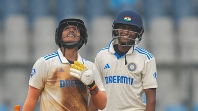 Deepti Sharma celebrates her half-century with Pooja Vastrakar on the second day of the one-off Test cricket match between India Women and Australia at the Wankhede Stadium in Mumbai, (PTI Photo) Deepti Sharma celebrates her half-century with Pooja Vastrakar on the second day of the one-off Test cricket match between India Women and Australia at the Wankhede Stadium in Mumbai, (PTI Photo)