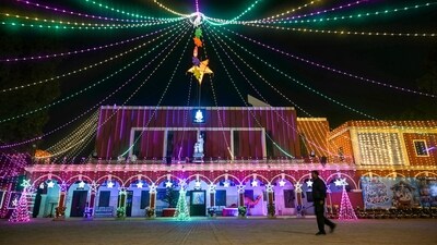 In Prayagraj, St Joseph's church boasted swathes of multicolored lighting bringing in Christmas cheer (PTI) In Prayagraj, St Joseph's church boasted swathes of multicolored lighting bringing in Christmas cheer (PTI)