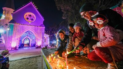 At St Paul's church in Amritsar, young children lit coloured candles in celebration of the holy day. (PTI) At St Paul's church in Amritsar, young children lit coloured candles in celebration of the holy day. (PTI)