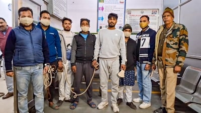 Sambhal: Police personnel with the accused arrested in connection with the November 24 violence that left four people dead. (PTI) Sambhal: Police personnel with the accused arrested in connection with the November 24 violence that left four people dead. (PTI)
