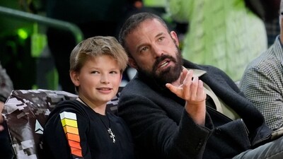 Actor Ben Affleck talks to his son Samuel before an NBA basketball game between the Los Angeles Lakers and the Toronto Raptors, Sunday, Nov. 10, 2024, in Los Angeles. (AP Photo/Marcio Jose Sanchez) (AP) Actor Ben Affleck talks to his son Samuel before an NBA basketball game between the Los Angeles Lakers and the Toronto Raptors, Sunday, Nov. 10, 2024, in Los Angeles. (AP Photo/Marcio Jose Sanchez) (AP)