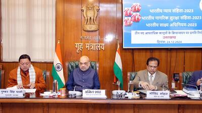 Union home minister Amit Shah holds a review meeting with Uttarakhand chief minister Pushkar Singh Dhami and other senior officials on the implementation of three new criminal laws in the state, in New Delhi on Tuesday. (ANI) Union home minister Amit Shah holds a review meeting with Uttarakhand chief minister Pushkar Singh Dhami and other senior officials on the implementation of three new criminal laws in the state, in New Delhi on Tuesday. (ANI)