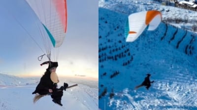 A woman paraglided in a witch costume with a broomstick, grabbing attention online. (Instagram/flyhellodidi) A woman paraglided in a witch costume with a broomstick, grabbing attention online. (Instagram/flyhellodidi)