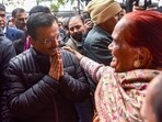 Aam Aadmi Party (AAP) National Convenor Arvind Kejriwal with a beneficiary woman during the start of the 'Mahila Samman Yojana' registration program. Aam Aadmi Party (AAP) National Convenor Arvind Kejriwal with a beneficiary woman during the start of the 'Mahila Samman Yojana' registration program.