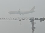 A DHL aircraft prepares to land during a foggy morning at the Kempegowda International Airport in Bengaluru. (File) A DHL aircraft prepares to land during a foggy morning at the Kempegowda International Airport in Bengaluru. (File)