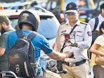 A police officer sustained head injuries after being attacked with a stick by a man obstructing traffic in the Malad area of Mumbai on Tuesday. (Photo by Anshuman Poyrekar/ Hindustan Times) 
