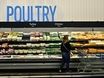 A shopper browses near the poultry section at a Walmart in Rosemead, California on December 19, 2024 (Photo by Frederic J. BROWN / AFP) A shopper browses near the poultry section at a Walmart in Rosemead, California on December 19, 2024 (Photo by Frederic J. BROWN / AFP)