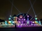 An elaborate holiday light display featuring music and imagery from the movie 