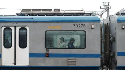 Bloomberg Best of the Year 2024: Passengers ride a train in Mumbai, India, on Monday, July 22, 2024. Photographer: Abeer Khan/Bloomberg Bloomberg Best of the Year 2024: Passengers ride a train in Mumbai, India, on Monday, July 22, 2024. Photographer: Abeer Khan/Bloomberg