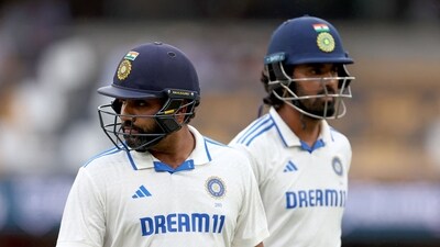 India's captain Rohit Sharma (L) reacts as he walks off the ground due to bad light with teammate KL Rahul on day three of the third cricket Test match between Australia and India at The Gabba (AFP) India's captain Rohit Sharma (L) reacts as he walks off the ground due to bad light with teammate KL Rahul on day three of the third cricket Test match between Australia and India at The Gabba (AFP)