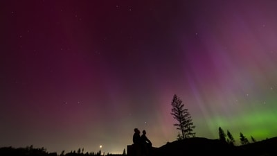 Christmas Day will feature a geomagnetic storm, enhancing the visibility of the Northern Lights for millions in 10 U.S. states. (AP Photo/Jenny Kane, File) (AP) Christmas Day will feature a geomagnetic storm, enhancing the visibility of the Northern Lights for millions in 10 U.S. states. (AP Photo/Jenny Kane, File) (AP)