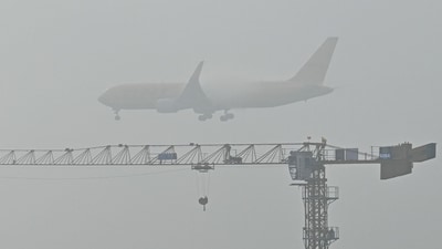 A DHL aircraft prepares to land during a foggy morning at the Kempegowda International Airport in Bengaluru. (File) (AFP) A DHL aircraft prepares to land during a foggy morning at the Kempegowda International Airport in Bengaluru. (File) (AFP)