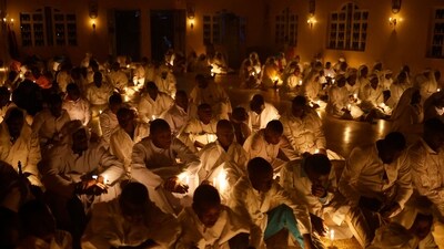Worshippers of the Legio Maria African Church Mission attend the Christmas Eve vigil mass at St. Helena Mathare Parish in the informal settlement of Mathare in Nairobi, Kenya. (AFP)