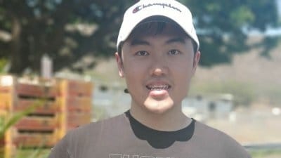 Yuchen Jin, CTO of Hyperbolic Labs, faced a green card denial from USCIS due to perceived lack of impact. (LinkedIYuchen Jin/X)