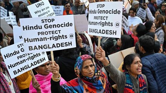 Protesters demonstrate in New Delhi to condemn the atrocities against Bangladeshi Hindus, who are a minority community in the neighbouring country, on December 10. (AFP Photo)