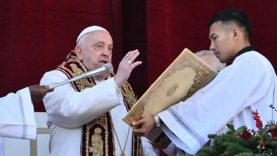 Pope Francis delivered the Urbi et Orbi message and blessing to the city and the world from the main balcony of St. Peter's Basilica on December 25, 2024, as part of Christmas celebrations at St Peter's Square in the Vatican. (AFP)