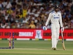 India's Shubman Gill walks off the field