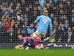 Manchester City's Erling Haaland sees his penalty saved by Everton goalkeeper Jordan Pickford.