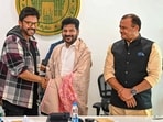 Telangana chief minister A Revanth Reddy with actor Venkatesh Daggubati during a meeting with directors, producers and actors of Telugu film industry in Hyderabad, on Thursday.