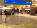Police investigate a Christmas shooting at Sky Harbor Airport in Phoenix late Wednesday, Dec. 25, 2024.  (KNXV via AP)