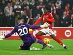 Nottingham Forest's Anthony Elanga scores against Tottenham.