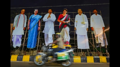 A biker rides past the cut-outs of Congress leaders as the party marks the 100th anniversary of its Belgaum session that was presided over by Mahatma Gandhi, in Belagavi, Karnataka. (PTI PHOTO) A biker rides past the cut-outs of Congress leaders as the party marks the 100th anniversary of its Belgaum session that was presided over by Mahatma Gandhi, in Belagavi, Karnataka. (PTI PHOTO)