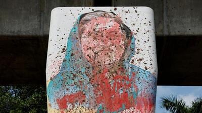 A mural of Bangladeshi ex PM Sheikh Hasina is seen vandalised by protesters days before in Dhaka on August 5, 2024 (REUTERS FILE PHOTO) A mural of Bangladeshi ex PM Sheikh Hasina is seen vandalised by protesters days before in Dhaka on August 5, 2024 (REUTERS FILE PHOTO)