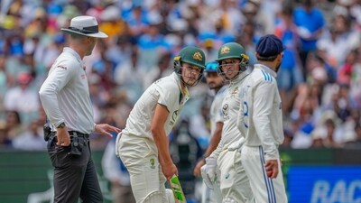 India's Virat Kohli, right, talks to Australia's Sam Konstas, second left, as Australia's Usman Khawaja, looks on during play on the first day of the fourth cricket test (AP) India's Virat Kohli, right, talks to Australia's Sam Konstas, second left, as Australia's Usman Khawaja, looks on during play on the first day of the fourth cricket test (AP)