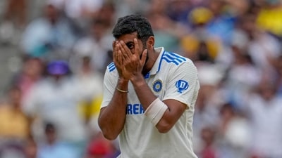 India's Jasprit Bumrah reacts as he celebrates the wicket of Australia's Usman Khawaja during play at the Melbourne Cricket Ground. (AP) India's Jasprit Bumrah reacts as he celebrates the wicket of Australia's Usman Khawaja during play at the Melbourne Cricket Ground. (AP)