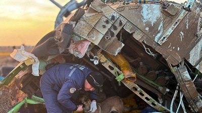 Azerbaijani airliner plane crash: A rescuer searched the wreckage of Azerbaijan Airlines' Embraer 190 lying on the ground near the airport of Aktau, Kazakhstan. (AP) Azerbaijani airliner plane crash: A rescuer searched the wreckage of Azerbaijan Airlines' Embraer 190 lying on the ground near the airport of Aktau, Kazakhstan. (AP)