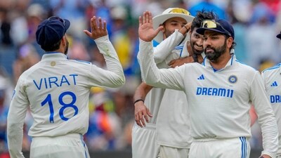 Rohit Sharma celebrates the wicket of Marnus Labuschagne with his teammates. (AP) Rohit Sharma celebrates the wicket of Marnus Labuschagne with his teammates. (AP)