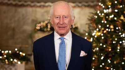 Britain's King Charles III smiles during the recording of his Christmas message at the Fitzrovia Chapel in central London on December 11, 2024. (Photo by Aaron Chown / POOL / AFP) (AFP)