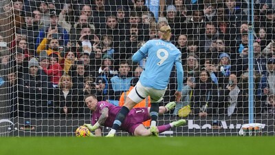 Manchester City's Erling Haaland sees his penalty saved by Everton goalkeeper Jordan Pickford. (AP) Manchester City's Erling Haaland sees his penalty saved by Everton goalkeeper Jordan Pickford. (AP)