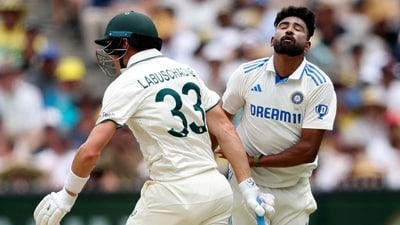 Australia's Marnus Labuschagne (L) collides with India's Mohammed Siraj (AFP)