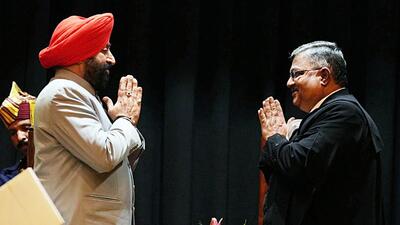 Justice Guhanathan Narendar greets Uttarakhand governor Singh after taking oath as the chief justice on Thursday (ANI) Justice Guhanathan Narendar greets Uttarakhand governor Singh after taking oath as the chief justice on Thursday (ANI)