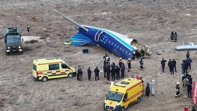 A drone view shows the crash site of an Azerbaijan Airlines passenger plane near Aktau, Kazakhstan. Firemen raced towards the aircraft to put out the flames at the scene of the crash. (REUTERS)
