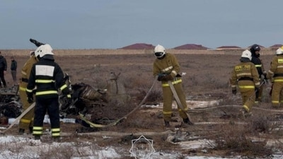 Kazakh rescuers' bodycam film captured the heartbreaking moments at the scene of Wednesday's Azerbaijan Airlines jet disaster near Aktau, Kazakhstan, which claimed 38 lives. Emergency specialists work at the crash site of an Azerbaijan Airlines passenger plane near the city of Aktau. ( REUTERS)