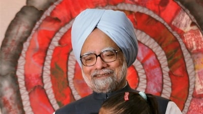 **EDS: FILE PHOTO: In this Aug. 24, 2010 photo, Prime Minister Manmohan Singh hugs two girls as he celebrates "Raksha Bandhan" with children in New Delhi on Tuesday. (PTI Photo/Vijay Verma)(PTI12_27_2024_000008A) (PTI) **EDS: FILE PHOTO: In this Aug. 24, 2010 photo, Prime Minister Manmohan Singh hugs two girls as he celebrates "Raksha Bandhan" with children in New Delhi on Tuesday. (PTI Photo/Vijay Verma)(PTI12_27_2024_000008A) (PTI)