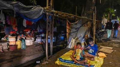 Mumbai, India. Oct 11, 2024: Residents of Jai Bheem Nagar have been living on the footpath at Powai for the last five months without light and water after the civic body demolished their houses. Oct 11, 2024. (Photo by Raju Shinde/HT Photo) (Hindustan Times) Mumbai, India. Oct 11, 2024: Residents of Jai Bheem Nagar have been living on the footpath at Powai for the last five months without light and water after the civic body demolished their houses. Oct 11, 2024. (Photo by Raju Shinde/HT Photo) (Hindustan Times)