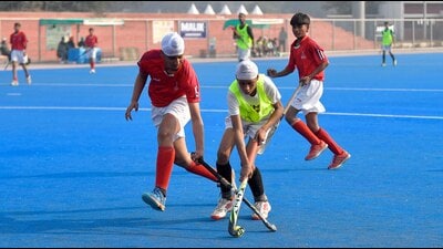 Players in action during a hockey match at PAU in Ludhiana on Thursday. (Manish/HT) Players in action during a hockey match at PAU in Ludhiana on Thursday. (Manish/HT)