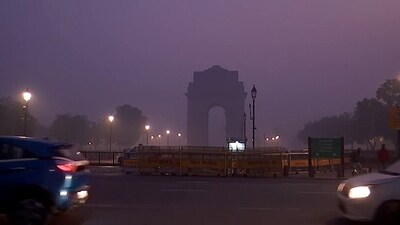 A thin layer of fog covers the area of Kartavya Path, in New Delhi on Wednesday. (ANI)