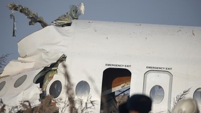 Emergency and security personnel are seen at the site of a plane crash near Almaty, Kazakhstan; the jet had deviated from its intended path, crossed the Caspian Sea, and circled over the region where it ultimately crashed close to Aktau. (REUTERS) Emergency and security personnel are seen at the site of a plane crash near Almaty, Kazakhstan; the jet had deviated from its intended path, crossed the Caspian Sea, and circled over the region where it ultimately crashed close to Aktau. (REUTERS)