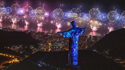 4. Rio De Janeiro, Brazil - A view of Christ the Redeemer above Rio De Janeiro during the New Year’s fireworks celebration in Brazil. The beaches of Copacabana host one of the world’s largest New Year’s Eve celebrations. Expect fireworks, live music, and millions of revelers dressed in white for good luck. (Fernando Maia / Riotur / AFP) 4. Rio De Janeiro, Brazil - A view of Christ the Redeemer above Rio De Janeiro during the New Year’s fireworks celebration in Brazil. The beaches of Copacabana host one of the world’s largest New Year’s Eve celebrations. Expect fireworks, live music, and millions of revelers dressed in white for good luck. (Fernando Maia / Riotur / AFP)