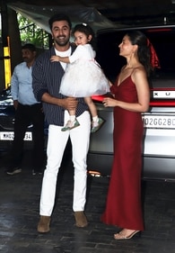 Actor-couple Ranbir Kapoor and Alia Bhatt with daughter Raha Kapoor pose for pictures upon their arrival for the Kapoor family's Christmas lunch in Mumbai on Wednesday. (PTI) Actor-couple Ranbir Kapoor and Alia Bhatt with daughter Raha Kapoor pose for pictures upon their arrival for the Kapoor family's Christmas lunch in Mumbai on Wednesday. (PTI)