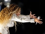 Beyoncé performs during halftime of an NFL football game between the Houston Texans and the Baltimore Ravens, Wednesday, Dec. 25, 2024, in Houston. (AP Photo/David J. Phillip)