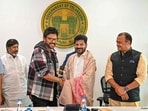 Telangana Chief Minister A. Revanth Reddy with actor Venkatesh Daggubati during a meeting with directors, producers and actors of Telugu film industry, Dec. 26, 2024. (PTI Photo)