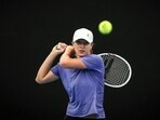 Poland's Iga Swiatek hits a shot during a practice session.