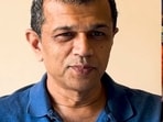 Rajesh Shah has been serving free lemonade to runners for over 12 years.